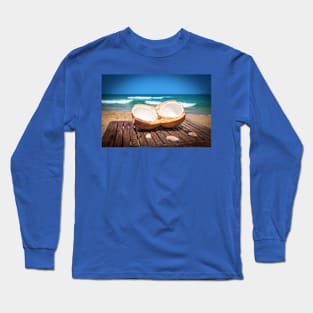 Coconut on the table against beautiful beach Long Sleeve T-Shirt